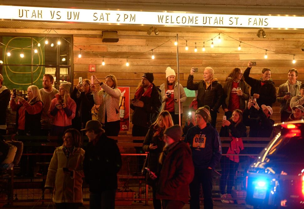 (Francisco Kjolseth | The Salt Lake Tribune) People snap pictures as BudweiserÕs iconic Clydesdales make a special trip to Utah to celebrate the changing beer laws in the state, joined by a Òghoulish group of pallbearers,Ó on Wed. Oct. 30, 2019, for a funeral procession for UtahÕs last remaining 3.2 percent beer, on their way to Bar X, Beer Bar and JohnnyÕs on 200 South in Salt Lake City, as the state prepares to start selling 5 percent alcohol-by-volume in grocery and convenience stores starting Friday.