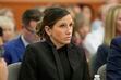 (Rick Bowmer | AP) Kouri Richins, a Utah mother of three who authorities say fatally poisoned her husband, Eric Richins, then wrote a children's book about grieving, looks on during a hearing Friday, Nov. 3, 2023, in Park City.