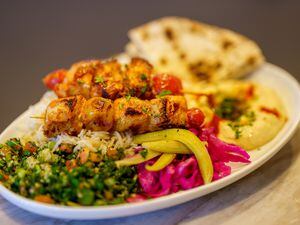 (Trent Nelson  |  Salt Lake Tribune file photo) The Laziz Mediterranean Platter with chicken (Tawook Skewers) Laziz Kitchen in Salt Lake City. Laziz is opening a second restaurant, with the same menu, in Midvale.