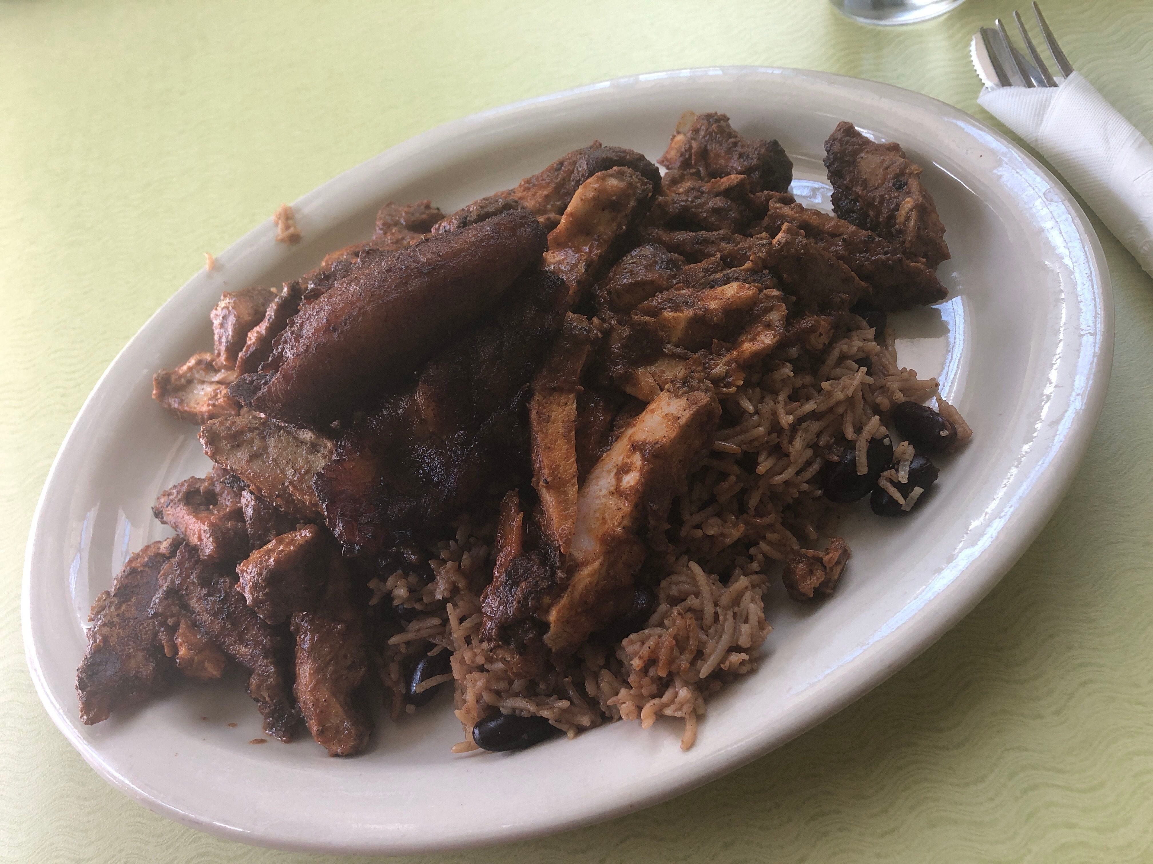 (Kolbie Peterson | The Salt Lake Tribune) The grilled jerk chicken from Kafe Mamai is shown on Saturday, April 20, 2024.