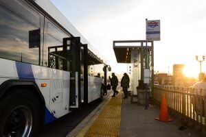 (Chris Samuels | The Salt Lake Tribune) A UTA bus picks up passengers in West Valley City, Thursday, Feb. 10, 2022.