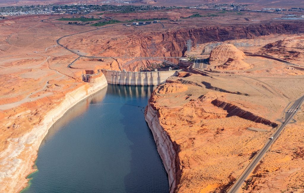 (Ecoflight) An aerial view of the Glen Canyon Dam at Lake Powell, Thursday, April 14, 2022.