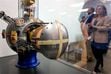 (Francisco Kjolseth  |  The Salt Lake Tribune) An Advanced Inertial Reference Sphere (AIRS) with Floated Inertial Measurement Ball (FLIMBAL) navigation system is on display at Draper, a major engineering firm from Cambridge, Mass., opening a campus in Clearfield, on Tuesday, April 23, 2024. The company has a decades-long partnership with the U.S Air Force at Hill Air Force Base, and has plans for Utah in sectors including biotechnology, electronic systems, space systems and national security.