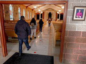 (Francisco Kjolseth  | The Salt Lake Tribune) Physically distance worshippers attend Mass on Ash Wednesday at Sacred Heart Church in Salt Lake City in 2021. A new study questions whether faith dropped dramatically during the COVID-19 pandemic.
