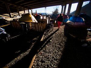 (Rick Egan | The Salt Lake Tribune) Camp Last Hope was built on abandoned railroad tracks under the freeway for protection from the rain and the snow. Tuesday, Jan. 5, 2021.