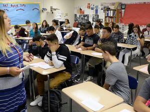 Al Hartmann  |  The Salt Lake Tribune
Teacher Brook Taylor gives her new students their first writing assignment for ACT Prep class at Granger High School. There is not an empty seat in her modular classroom. She has over 40 students.