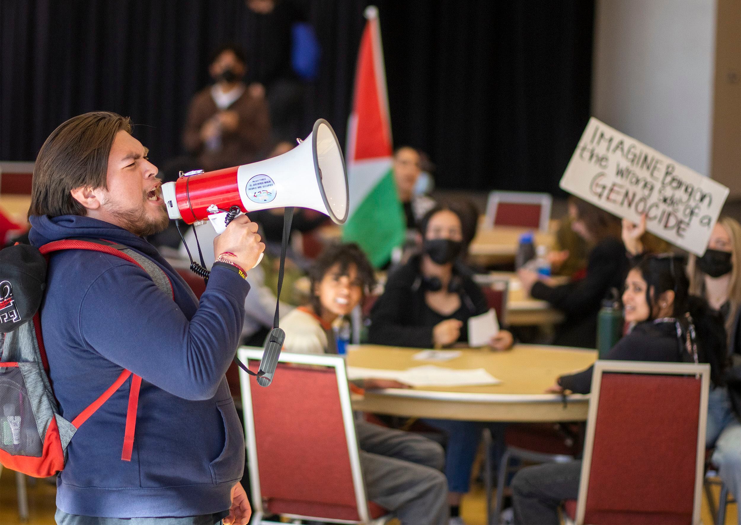 (Rick Egan | The Salt Lake Tribune) Julio Irungaray leads the crowd in a chant during a sit-in, as the group Mecha occupies the Union Ballroom during a protest on the University of Utah Campus, on Wednesday, Nov. 15, 2023.