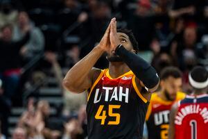 (Rick Egan | The Salt Lake Tribune) Utah Jazz guard Donovan Mitchell (45) celebrates after putting the Jazz up by 2 points with 2:50 remaining the the game, in NBA action between the Utah Jazz and the Washington Wizards, at Vivint Arena on Saturday, Dec. 18, 2021.
