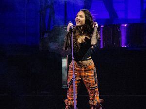 (Isaac Hale | Special to The Tribune) Olivia Rodrigo performs as part of her “Sour” tour stop at the UCCU Center in Orem on Saturday, April 9, 2022.