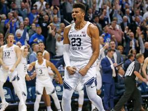 BYU forward Yoeli Childs (23) reacts after dunking against Gonzaga during the second half of an NCAA college basketball game Saturday, Feb. 22, 2020, in Provo, Utah. (AP Photo/Rick Bowmer)
