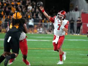 Utah quarterback Cameron Rising (7) throws a pass against Arizona State during the first half of an NCAA college football game Saturday, Sept. 24, 2022, in Tempe, Ariz. (AP Photo/Rick Scuteri)