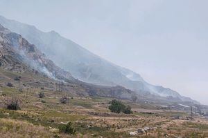 (Utah Fire Info) The Lakeshore Fire is photographed late last week as it burns a few miles west of the Great Saltair. Crews have fully contained the fire.