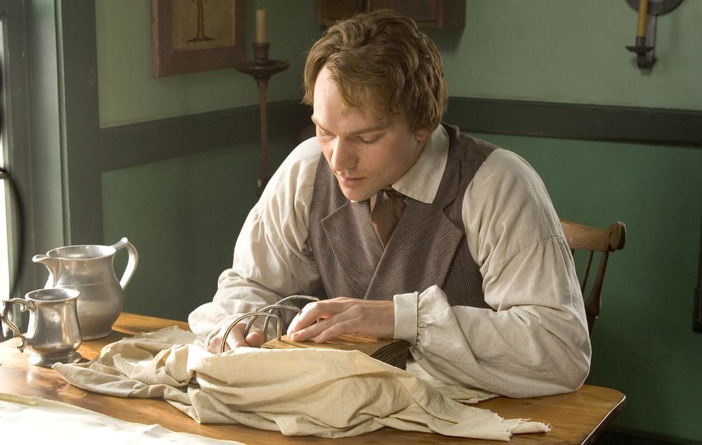 (The Church of Jesus Christ of Latter-day Saints) Actor portraying the Prophet Joseph Smith in the church's 2005 movie, "Joseph Smith: The Prophet of the Restoration" examines gold plates containing the Book of Mormon.
