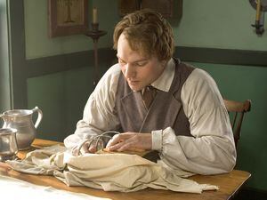(The Church of Jesus Christ of Latter-day Saints) An actor portraying the Prophet Joseph Smith in the church's 2005 movie, "Joseph Smith: The Prophet of the Restoration" examines gold plates containing the Book of Mormon.