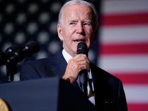 (Evan Vucci | AP) President Joe Biden speaks about student loan debt relief at Delaware State University, Friday, Oct. 21, 2022, in Dover, Del. A U.S. judge in Texas on Thursday, Nov. 9, 2022, blocked Biden's plan to provide millions of borrowers with up to $20,000 apiece in federal student-loan forgiveness.