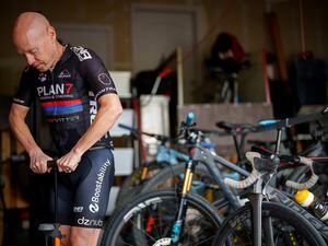 (Trent Nelson  |  The Salt Lake Tribune) Triathlete Kyle Brown gets ready for a bike ride at his home in Fruit Heights on Tuesday, April 26, 2022.