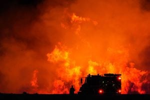 (Francisco Kjolseth | The Salt Lake Tribune) A grass fire burns between Saltair and the Great Salt Lake Marina off I-80 on Saturday, April 30, 2022.
