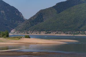 (Francisco Kjolseth  |  The Salt Lake Tribune) The state's water systems have been forced to contend with Utah's drought, which left reservoirs empty this summer. Pineview Reservoir, a popular recreation spot in Ogden Valley is now a quarter full as seen on Thursday, Aug. 12, 2021.