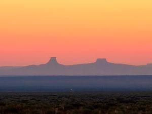 (Megan Marples | Cronkite News via AP) The sun rises over the Navajo Nation Reservation on Sept. 24, 2020, near Pinon, Ariz.