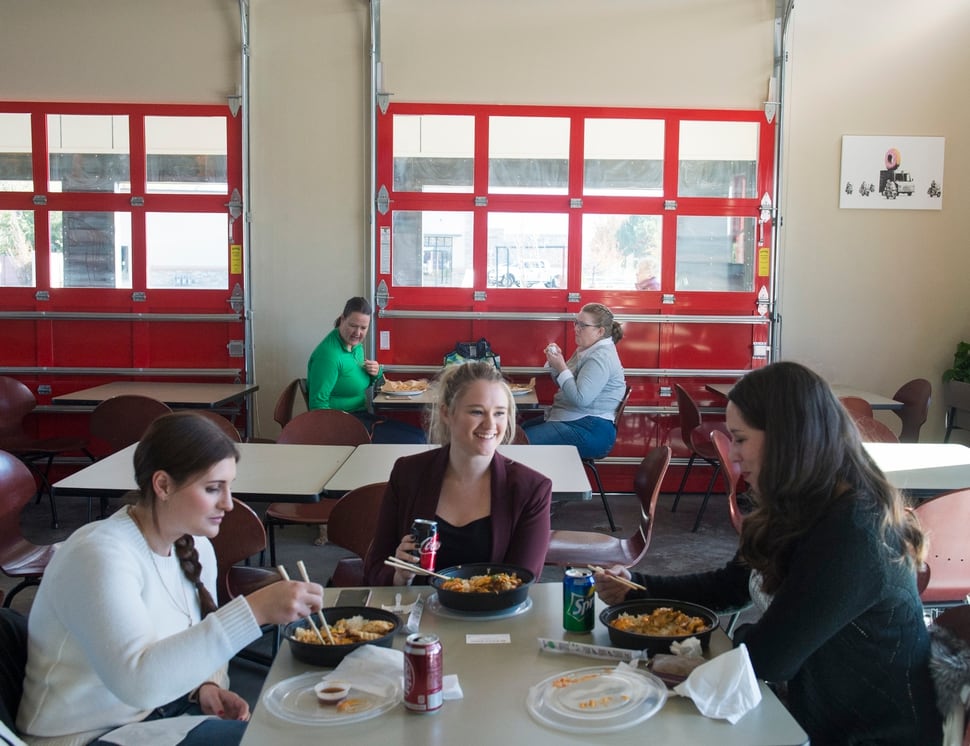 At The Hub in South Jordan, food trucks park outside, while diners get
