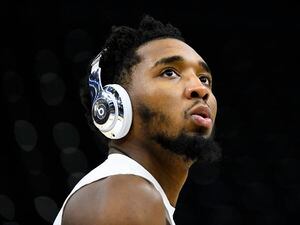 Utah Jazz guard Donovan Mitchell warms up before an NBA basketball game against the Cleveland Cavaliers Wednesday, Jan. 12, 2022, in Salt Lake City. (AP Photo/Alex Goodlett)