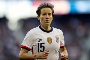 (AP Photo/Steve Luciano, File) In this March 8, 2020, file photo, U.S. forward Megan Rapinoe runs during the second half of a SheBelieves Cup soccer match against Spain in Harrison, N.J.