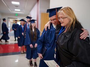(Trent Nelson  |  The Salt Lake Tribune) Ryan Fleck and counselor Chandra Walker after commencement exercises at Kings Peak High School in Bluffdale on Thursday, June 2, 2022.