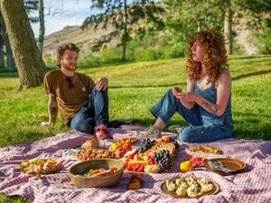 (Trent Nelson  |  The Salt Lake Tribune) Griffen Nebeker and McKenzie Wallace, who stage picnics as founder of Salt Lake Picnic Society, in Salt Lake City on Thursday, June 9, 2022.