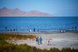 (Trent Nelson  |  The Salt Lake Tribune) People on the shore of the Great Salt Lake on Saturday, Sept. 16, 2023.