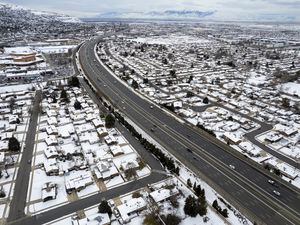 (Rick Egan | The Salt Lake Tribune)  Homes in both sides of Interstate 15 as it winds through Woods Cross on Thursday, Jan. 5, 2023. The state is proposing to expand the freeway between Farmington and Salt Lake City.