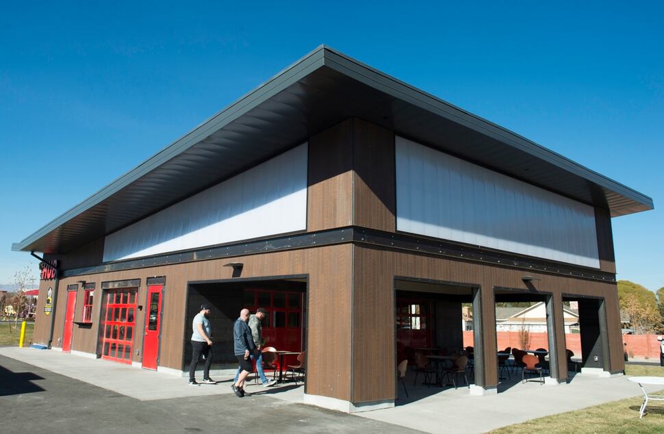 At The Hub in South Jordan, food trucks park outside, while diners get