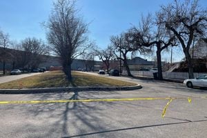 (Alex Vejar | The Salt Lake Tribune) A block near 100 South and 800 West in Salt Lake City is cordoned off by police investigating a homicide in the area that occurred the morning of Sunday, Jan. 23, 2022.