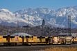 (Francisco Kjolseth  |  The Salt Lake Tribune) Locomotives are pictured with the Salt Lake City skyline on Tuesday, March 19, 2024.