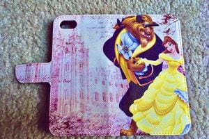 (Photo courtesy of Katie Abernathy Hoyos) A phone case that shows Disney characters in front of the LDS Temple in Salt Lake City has taken the internet by storm.