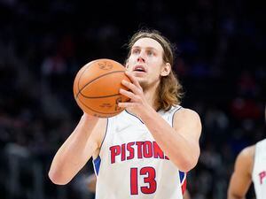 (Carlos Osorio | AP) Then with the Detroit Pistons, Kelly Olynyk shoots a free throw during the second half of an NBA basketball game against the Milwaukee Bucks, Tuesday, Nov. 2, 2021, in Detroit.