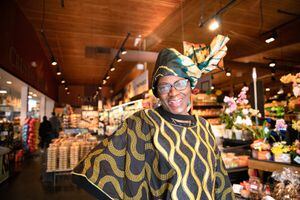 (Rachel Rydalch | The Salt Lake Tribune) Cathy Tshilombo-Lokemba — who, as Mama Africa, is known for her pili-pili hot sauce — at Harmons Emigration Market in Salt Lake City on Friday, Jan. 14, 2022.
