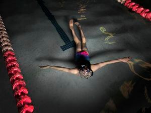 (Leah Hogsten | The Salt Lake Tribune) A 13-year-old transgender girl swims on April 4, 2022. The teen, who has won numerous medals as a competitive swimmer, said she quit the sport because of the passage of Utah's House Bill 11, which bans transgender girls from competing in school sports.