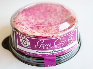 (Leah Hogsten | The Salt Lake Tribune) Gem City Fine Foods' Pomegrante Cheesecake, Aug. 27, 2021. Gem City Fine Foods, a gluten-free bakery in West Valley City, makes one of the best cheesecakes in America, according to the Specialty Food Association, earning a silver medal in 2021. 