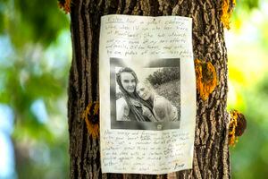 (Rick Egan | The Salt Lake Tribune)  A poster on a tree near the Moonflower Community Co-op in Moab, where Kylen Schulte used to work, on Friday, Sept. 17, 2021. Schulte was found murdered along with her wife, Crystal Turner, in August in the mountains outside Moab. The FBI has ruled out any connection between their case and the one involving Gabby Petito.