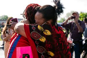 (Joshua Rashaad McFadden | The New York Times)

Two women embrace on Sunday, May 15, 2022, during a  vigil for the victims of the mass shooting at Tops supermarket in Buffalo, N.Y. A day after one of the deadliest racist massacres in recent American history, law enforcement officials in New York descended on the home of the accused gunman and probed disturbing hints into his behavior, as Gov. Kathy Hochul promised action on hate speech that she said spreads "like a virus."