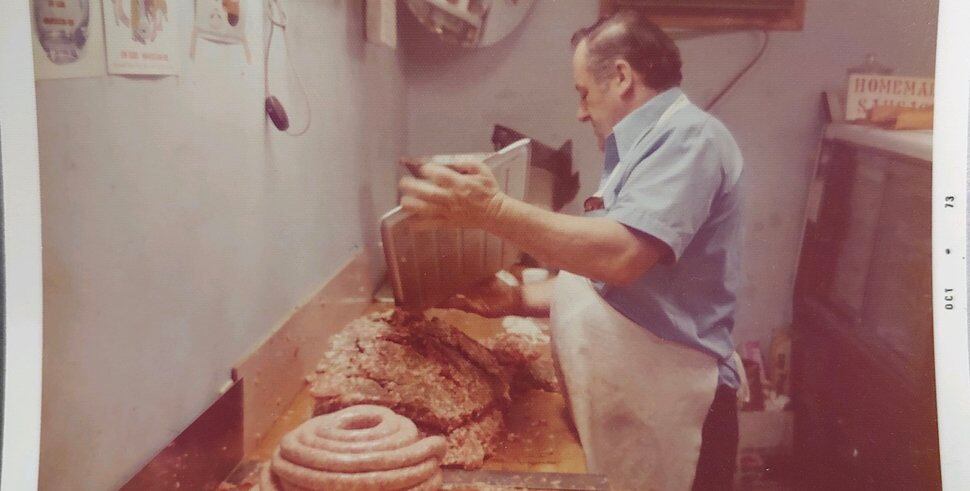 (Photo courtesy of Craig Gerome) Silvio Gerome makes sausages in the “butcher’s room” of the original Gerome’s Market in Bristol, Pa. His grandson, Craig Gerome, has launched his own Gerome’s Market in Utah.