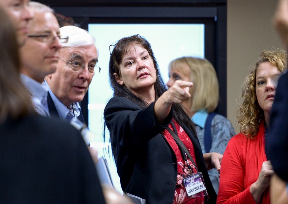 (Leah Hogsten | The Salt Lake Tribune) Senate District 11 volunteer Carrie Dickson re-counts the 134 delegates after two ballots were found to have been stuck together, resulting in a count of 135 ballots cast at the Utah Republican Nominating Convention Saturday, April 21, 2018 at the Maverik Center. 