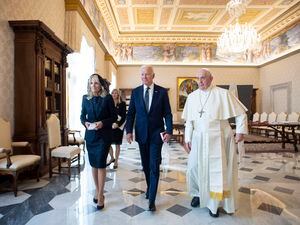 (Vatican Media via AP) U.S. President Joe Biden, first lady Jill Biden and Pope Francis walk as they meet at the Vatican, Friday, Oct. 29, 2021.