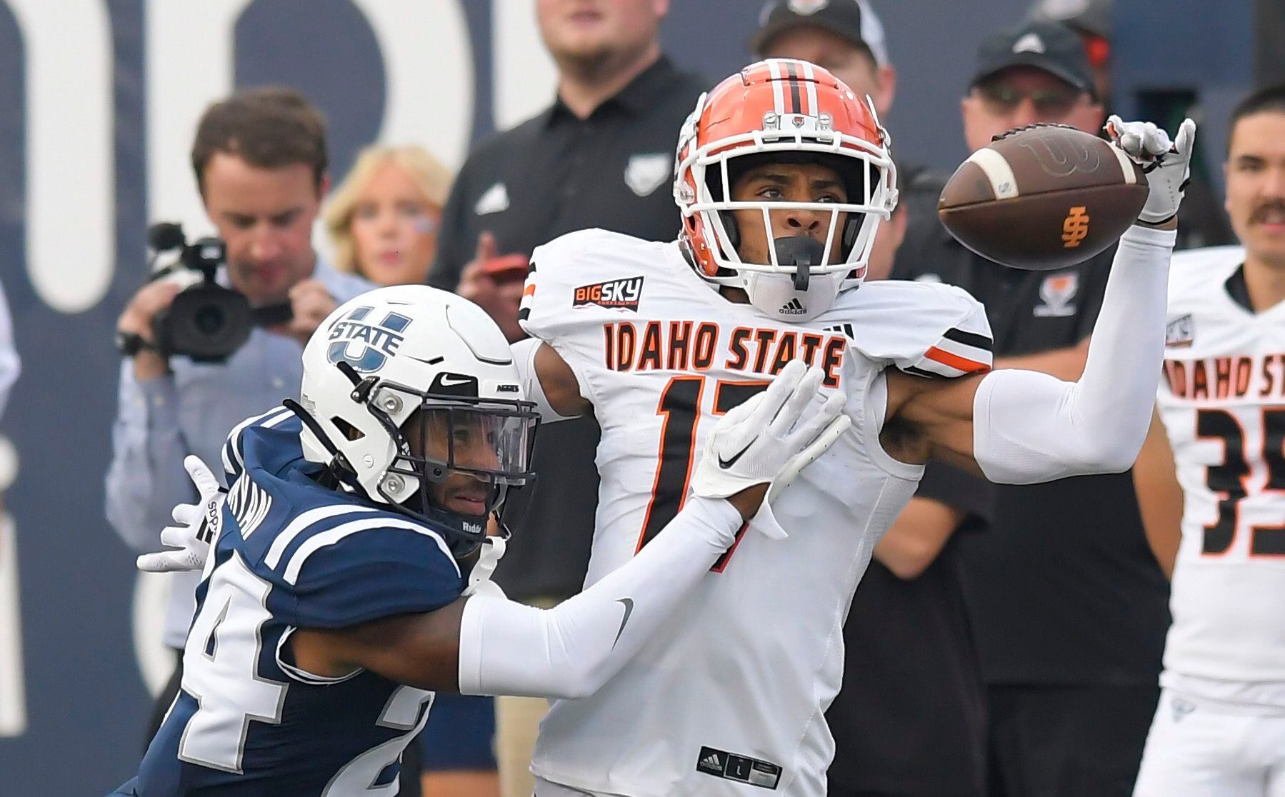 Utah State cornerback Gabriel Bryan, left, breaks up a pass intended for Idaho State wide receiver Cyrus Wallace during the first half of an NCAA college football game Saturday, Sept. 9, 2023, in Logan, Utah. (Eli Lucero/The Herald Journal via AP)