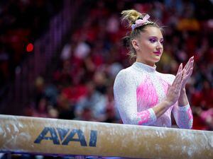 (Trent Nelson  |  The Salt Lake Tribune) Makenna Smith on the beam as Utah hosts California, NCAA gymnastics in Salt Lake City on Friday, Feb. 24, 2023.