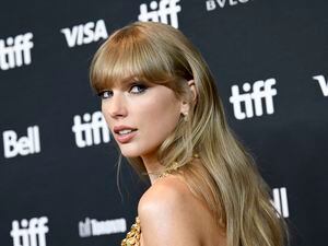 (Evan Agostini | Invision/AP) Taylor Swift, seen here Sept. 9, 2022, at the Toronto International Film Festival, released her latest album, "Midnights," late Thursday night, Oct. 20, 2022. Utah Gov. Spencer Cox and his daughter, Emma Kate, were among those staying up to download the album on its release.