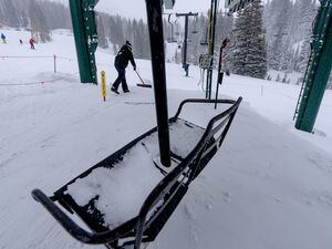 (Francisco Kjolseth | The Salt Lake Tribune) The Albion lift nears its final turns at Alta as skiers get a chance to ride the two-person lift one last time before closing for good on Tuesday, April 12, 2022. After 60 years in operation, the old two-person lift, along with the Sunnyside lift that serves the same area, in in the process of being replaced with a six-person high-speed lift.