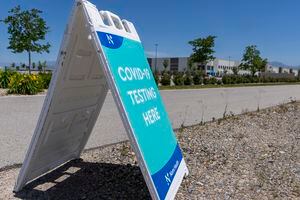 (Leah Hogsten | The Salt Lake Tribune) The Nomi Health COVID-19 testing site in the parking lot of Amazon Friday, June 10, 2022 in Salt Lake City. Thirteen more Utahns died of COVID-19 in the past week as case counts and hospitalizations throughout the state declined.
