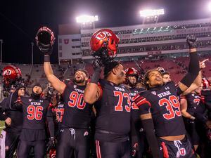 (Rick Egan | The Salt Lake Tribune) The Utah Utes sing the fight song with after the Ute's defeated the Stanford Cardinals, 42-7, in PAC-12 football action at Rice-Eccles Stadium, on Saturday, Nov. 12, 2022.