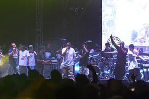 In this Sunday, Sept. 25, 2016 photo, a drone approaches the stage as Bone Thugs-n-Harmony, perform during the High Life Music Festival at the High Desert Event Center in Victorville, Calif. Stanley Flesh-N-Bone Howse, right, was struck by the drone while performing onstage.  (David Pardo/The Daily Press via AP)